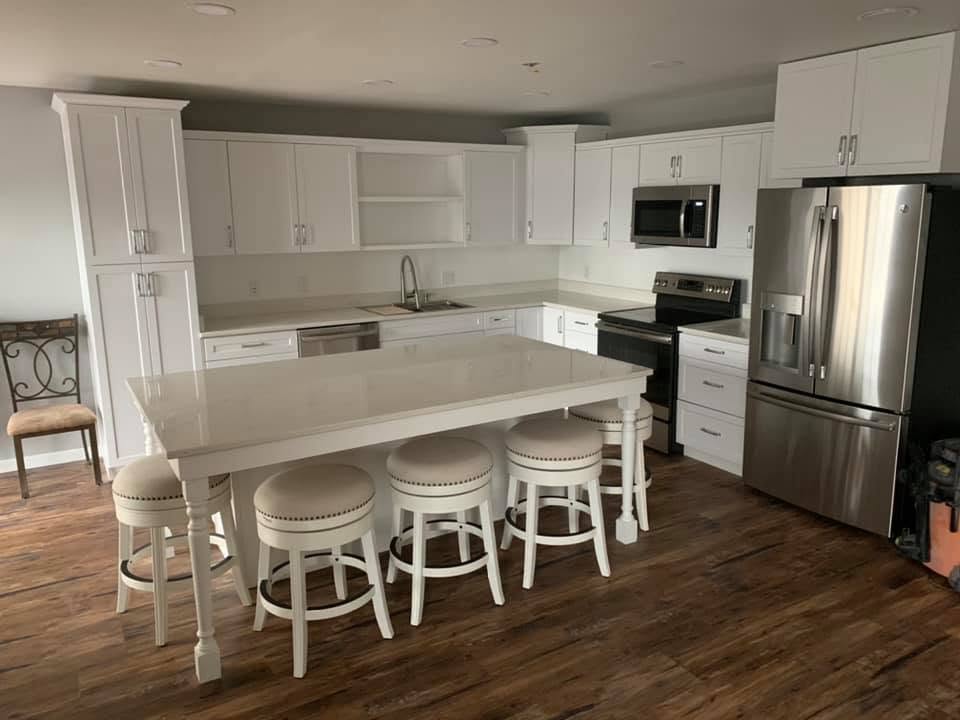 Bright white kitchen with an island
