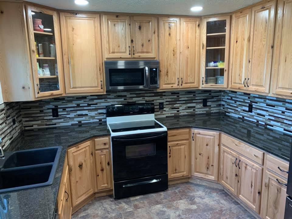 Kitchen with wood cabinets and an island