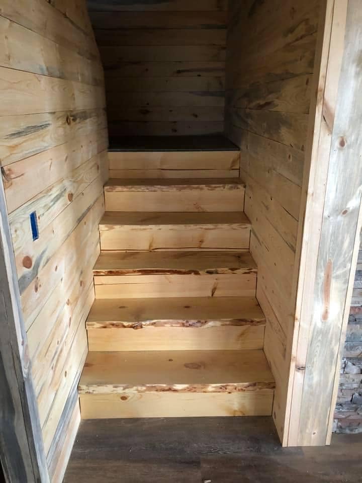 Finished wood-paneled stairway